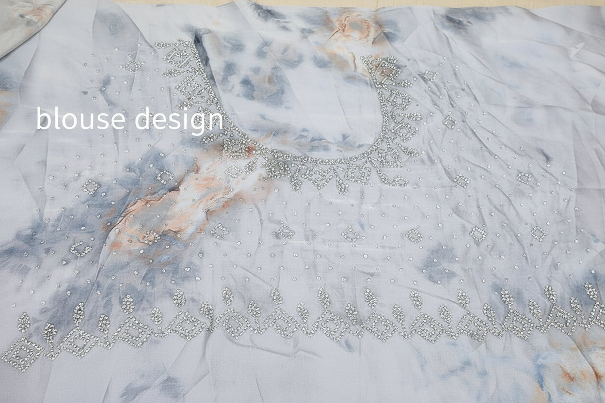 Ethereal sage green floral saree with scalloped stone border