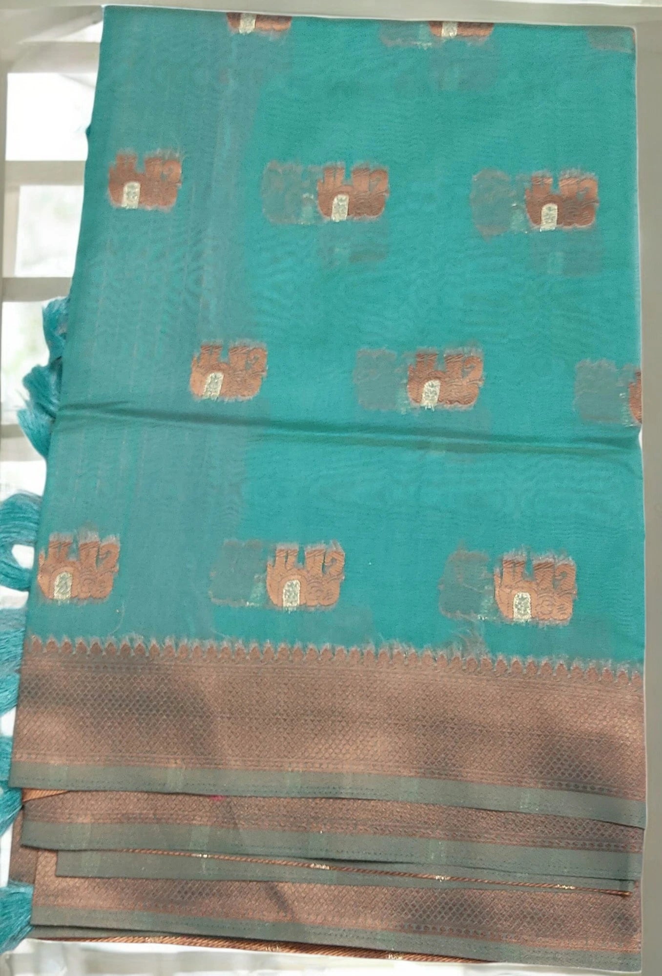 Turquoise organza Deepika silk saree