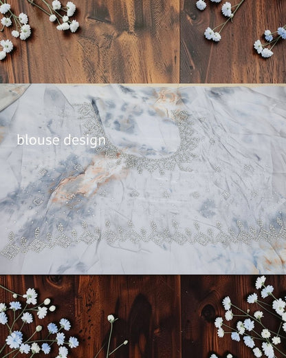 Ethereal sage green floral saree with scalloped stone border