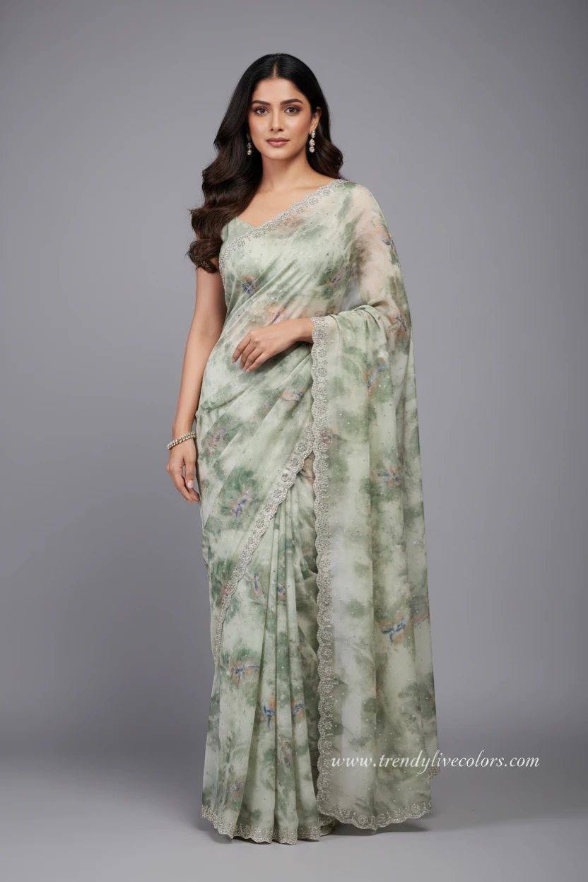Ethereal sage green floral saree with scalloped stone border