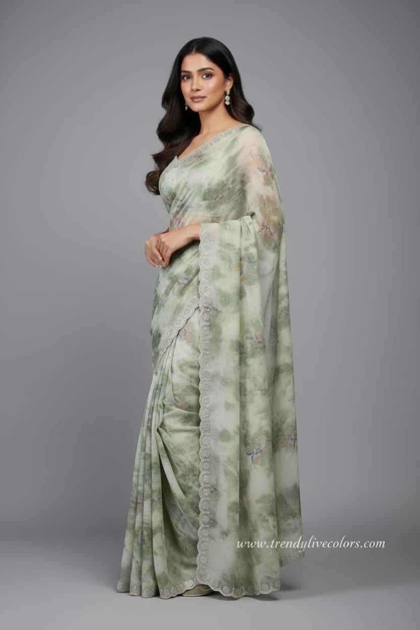 Ethereal sage green floral saree with scalloped stone border