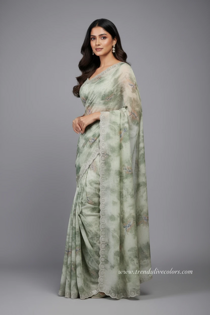Ethereal sage green floral saree with scalloped stone border